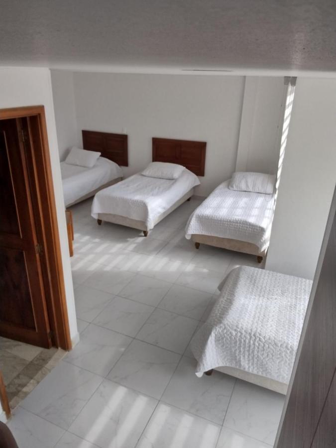Hotel Zuhe Paipa Bagian luar foto